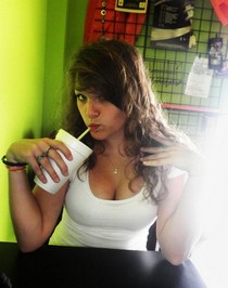Young teen girl showing